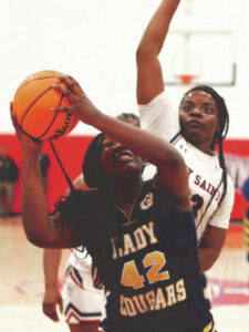 Southern Wayne splits with G’boro in hoops action