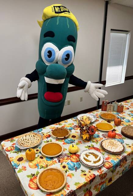 129110586_web1_Ollie-Thanksgiving
Mt. Olive Pickle Companys Ollie Q. Cumber claims Sweet Gherkins as his favorite Thanksgiving dessert, but he sure looks sweet on sweet potato pie(Courtesy Mt. Olive Pickle)