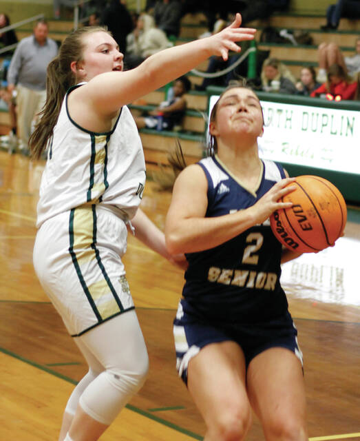 129117634_web1_ND-Girls-1
North Duplin sophomore forward Eva Quintanilla, right, attempts to block a shot by Jones Seniors Lynn King during first-half action of their game in Calypso on Tuesday evening.|(Rudy Coggins/mountolivetribune.com)