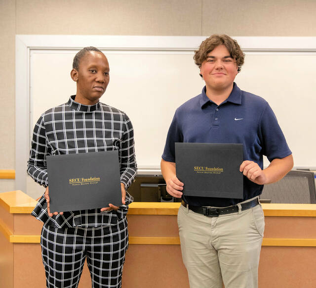 129137062_web1_WCC-Ppl-Helping-Ppl-Scholarships
Karen Taft and Titus Dezern are recipients of $5,000 People Helping People scholarships from the State Employees Credit Union.