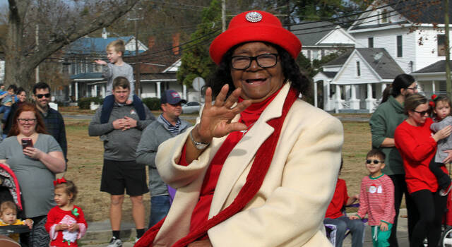 129145925_web1_Newkirk
Mount Olive Christmas Parade Grand Marshal Lula Newkirk waves to the crowd lining Center Street during the Saturday, Dec. 3 parade that boasted more than 140 units. (Steve Herring|mountolivetribune.com)
