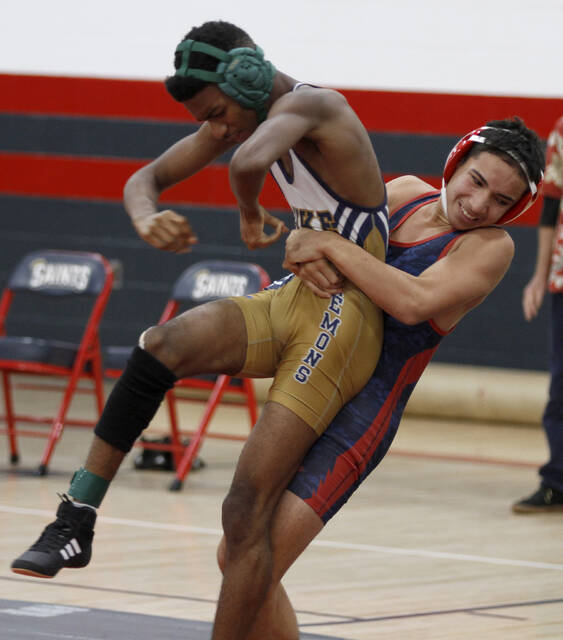 129161867_web1__MG_2254
Shown here taking down an opponent earlier this season, Southern Wayne freshman Omar Soler Sanchez collected two pins during the Saints dual encounters with West Johnston and East Wake on Wednesday evening. (Rudy Coggins|mountolivetribune.com)