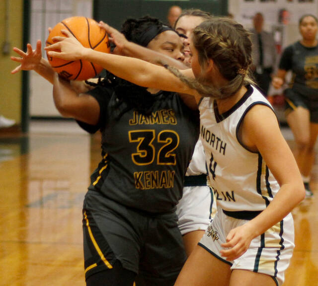 129184024_web1__MG_0978
James Kenans KonNiya Joyner (32) gets trapped by North Duplins Reece Outlaw (4) and Addy Higginbotham during second-half action of their game Wednesday evening. (Rudy Coggins|mountolivetribune.com)