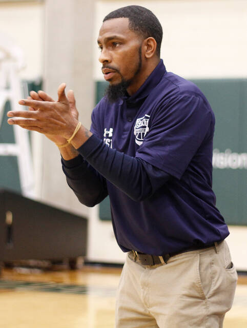 129258593_web1__MG_1809
Second-year Southern Wayne head varsity boys basketball coach Brian West encourages his team during a recent game. The Saints rose to 4-0 in Quad County 3A play with a last-second triumph over Smithfield-Selma on Tuesday evening. (Rudy Coggins|mountolivetribune.com)