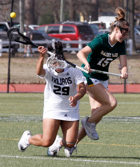 129354160_web1_WLAX1
University of Mount Olives Alexis Stanley, left, gets tripped up by St. Leos Fiona McLaughlin during their top-25 womens lacrosse match played at the Ray McDonald Sports Complex on Friday. (Rudy Coggins|mountolivetribune.com)