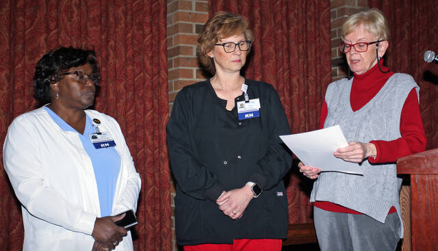 129364888_web1_WISH
Mount Olive Town Commissioner Barbara Kornegay, right, reads a proclamation for National School-Based Health Care Awareness Month (honoring Wayne Initiative for School Health, also known as WISH) during the town boards Feb. 14 session Kornegay is joined by nurses Pam Anderson, left, WISH director, and Alice Summerlin,WISH centers manager.
