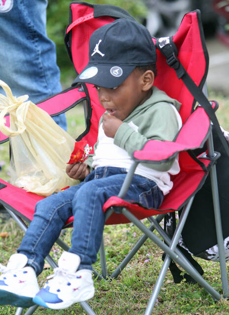 129396201_web1_Parade-1
Josiah Clark, 2, samples some of the candy thrown out during the 15th annual Mount Olive Black History Month Parade held Saturday, Feb. 25 (Steve Herring|mountolivetribune.com)