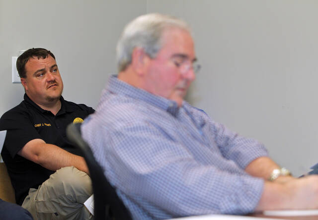 129433050_web1_Cameras
Mount Olive Police Chief Jason Hughes talks about efforts to get the towns failed video surveillance system back up and running while Mayor Pro-tem Steve Wiggins takes notes. The cameras were discussed during an ordinance and contracts work session held Tuesday night, March 7, in the town hall conference room (Steve Herring|mountolivetribune.com)