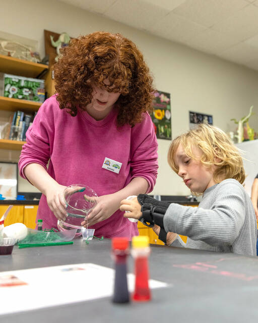 129543449_web1_WCCScienceNight
A Wayne Community College student assists a participant during the recent Science Night for children. The Art of Science will provide similar hands-on activities 10 a.m.-1 p.m. on April 22 at the college. (Courtesy photo|WCC)
