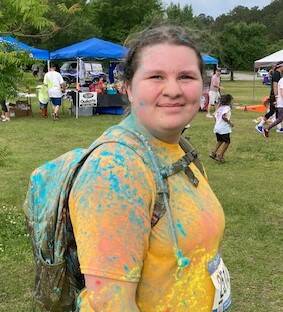 129684500_web1_maggie-1
On April 22, Marggret-Ann Maggie Barber completes the Red, White, and Blue Color 5K Run in Jacksonville, benefiting the Navy Marine Relief Society.(Janelle Barbour|Courtesy photo)