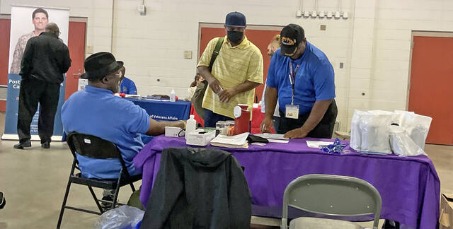 129760782_web1_Stand-Down-2
Veterans sign up for information during the 2022 Duplin County Veterans Stand Down. Vendors are now being sought for the second annual event to be held from 10 a.m. to 2 p.m. Thursday, July 13, at the Campbell Center, 513 Southeast Railroad St., Wallace. (Courtesy photo)