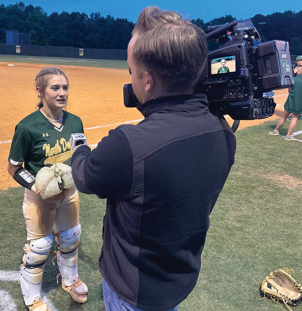 129793622_web1_KaseyJones
North Duplin graduate Kasey Jones talks with a television reporter after the Rebels defeated East Columbus to win the east regional and advance to the NC High School Athletic Association Class 1A state softball championship series. Jones was one of four Rebels to receive postseason honors from the NC Fastpitch Coaches Association for 2023. (Rudy Coggins|mountolivetribune.com)