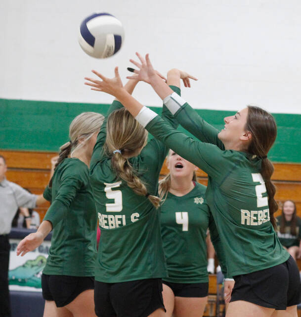 129925859_web1_NDvolleyball
North Duplin players celebrate winning a point against Spring Creek on Tuesday afternoon. The Rebels claimed a three-set sweep over Lejeune on Wednesday and travel to East Duplin today. (Rudy Coggins|mountolivetribune.com)