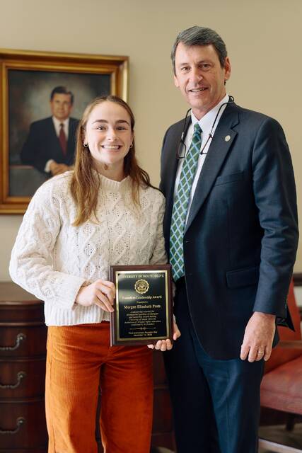 130147834_web1_DSC06915
This years Founders Leadership Award was presented to Morgan Elizabeth Prots, a senior elementary education major from Whispering Pines. Pictured with Prots is UMO President Dr. H. Edward Croom.