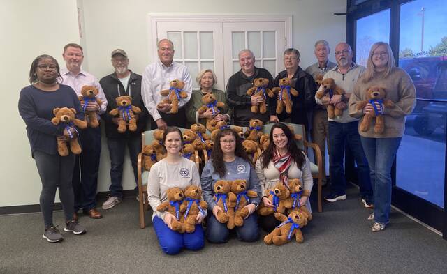 130183208_web1_bears-1
Teddy bears outnumber people during Tuesdays presentation of 50 bears by the Exchange Club of Mount Olive to the Mount Olive Childrens Advocacy Center. Pictured, back row, from left: are: Latoya Mobley, James Kornegay, Michael Thompson, Dwayne McKay, Hazel Wiggins, Steve Wiggins, Lynwood Herring, Gary Barefoot, Bryant Gibson and Lela Best. Front row, from left,are: Brittany Parent, Belinda Parent and Amberely Davis. Mobley, Gibson and Best are with the Childrens Advocacy Center. Others pictured are with the Exchange Club. (Kathy Grant Westbrook|mountolivetribune.com)