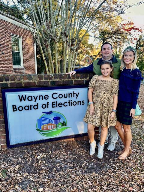 130201901_web1_Rep.-Bell-with-his-wife-Kelli-and-daughter-Averi-after-filing-for-re-election
N.C. Rep. John Bell, his wife Kelli and their daughter Averi pose outside the Wayne County Board of Election Tuesday after the six-term representative filed for re-election. (Courtesy photo)