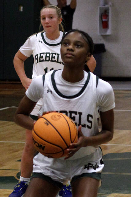 130313226_web1_NDTate
North Duplins Tateyawna Faison attempts a free throw during a game earlier this season. Faison tallied 15 points during the Rebels two-point road loss at Lakewood Friday evening. (Rudy Coggins|mountolivetribune.com)