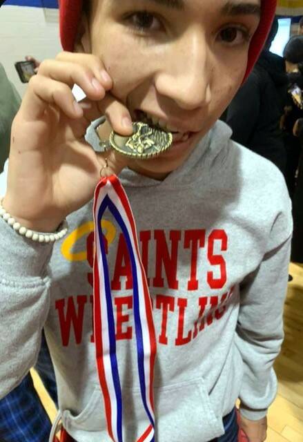 130314998_web1_S-Wayne-wrestling
Southern Wayne sophomore Omar Soler-Sanchez shows off the tradition of biting the gold medal after he won the 106-pound weight class in the season-ending Quad County 3A individual wrestling championships Saturday. (Contributed photo)