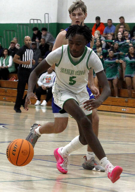 130332988_web1_SCBrennan
Spring Creeks Brennan Chambers (5) chases down a loose ball in a recent game. Chambers tallied 20 points in the Gators home loss to county and Neuse Six 2A rival Goldsboro Friday. (Rudy Coggins|mountolivetribune.com)