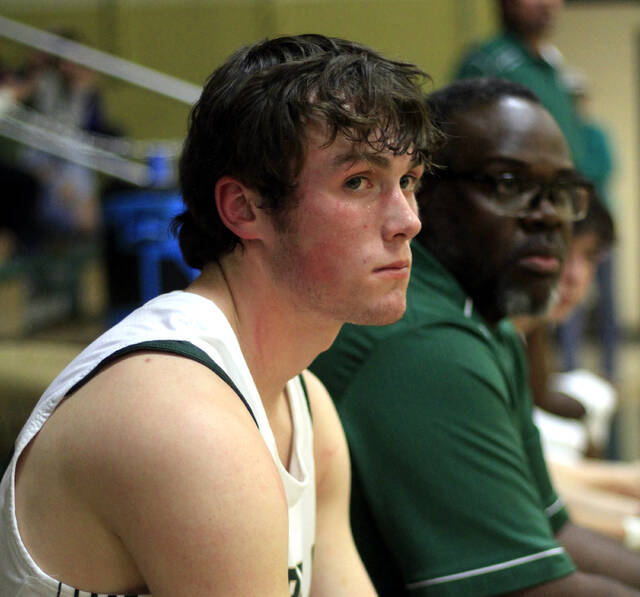 130370412_web1_LukeKelly
North Duplin junior guard Luke Kelly, left, and assistant coach Jamie Wallace watch action from the bench during a recent game. Kelly scored 13 points in the Rebels win Friday evening at Union. (Rudy Coggins|mountolivetribune.com)