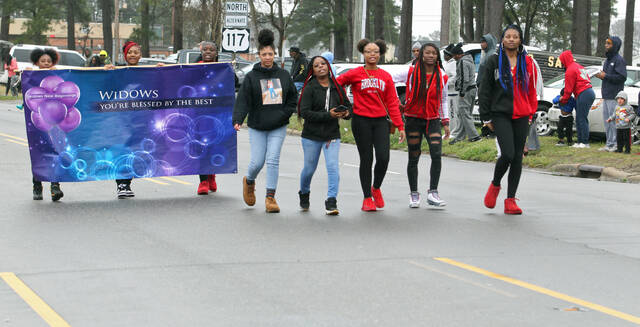 130374284_web1_Parade-4
The 16th annual Mount Olive Black History Month Parade will be held Saturday, Feb. 24. Here, a group marches in the 2023 parade. Entry deadline is Saturday. (Steve Herring|mountolivetribune.com)