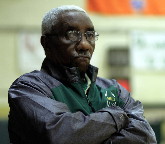 130384574_web1_John-Oliver
North Duplin head girls basketball coach John Oliver watches his team battle against an opponent earlier this season. (Rudy Coggins|mountolivetribune.com)
