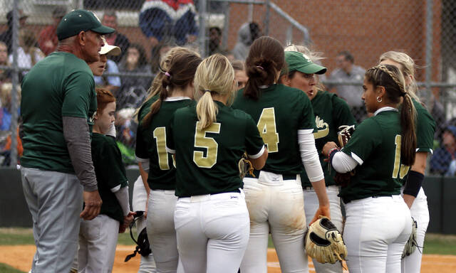 130436729_web1_NDSBPreview
North Duplin head softball coach Jaime Kylis (green cap) has a stern discussion with her team between innings during a game last season. The Rebels return seven starters who played on last years team which finished runner-up in the NC High School Athletic Association Class 1A state softball championship series. (Rudy Coggins|mountolivetribune.com)