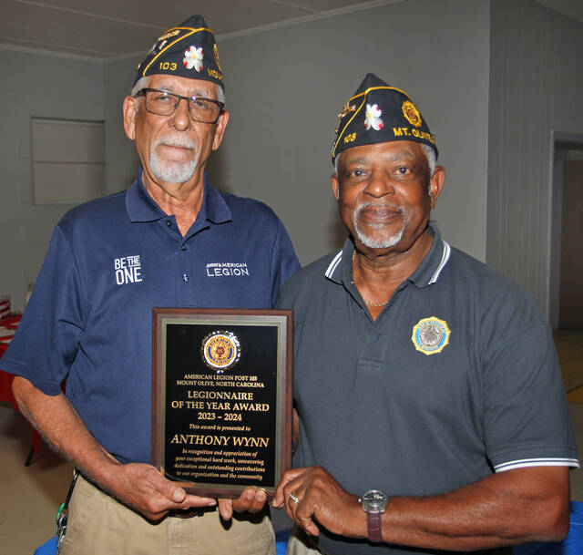 130674326_web1_Wynn
Anthony Wynn, right, Mount Olive American Legion Post 103 first vice commander, was honored as Legionnaire of the Year for 2023-24 during the posts June 6 meeting. Presenting the award is post Commander William Manuel. (Steve Herring|mountolivetribune.com)