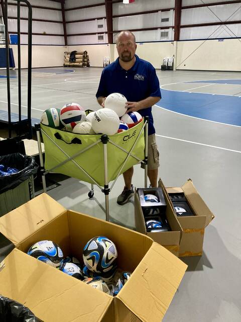 130911850_web1_faison-grant-1
Matthew Scott, director of Faisons Recreation and Wellness Center, unpacks a shipment of volleyballs and soccer balls, all received as part of a grant from Good Sports, a nonprofit based in Braintree, MA, that provides brand-new sports equipment to programs that serve high-need communities. (Kathy Grant Westbrook|mountolivetribune.com)