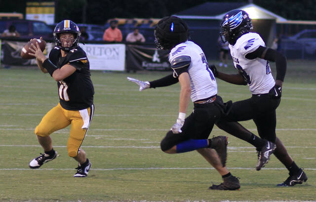 130930022_web1_EliAvent
James Kenan quarterback Eli Avent looks for an open receiver during a recent game. The junior signal caller accounted for a career-high 310 all-purpose yards offensively against East Duplin on Friday evening. (Rudy Coggins|mountolivetribune.com)