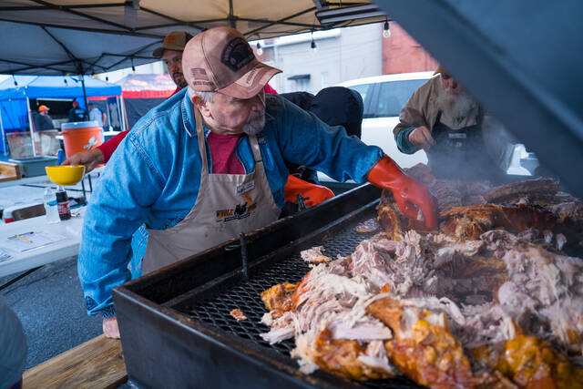 130933940_web1__KPA7310-Websize
Cook-off Judge Owen Jackson judges a Pickles, Pigs & Swigs entry during the 2023 Pickles, Pigs & Swigs. This years event returns Nov. 8-9 in downtown Mount Olive. (Courtesy photo)