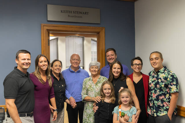 130963323_web1_stewart-dedication-002
Keith Stewarts family and friends surround the entrance to the Keith Stewart Boardroom after its dedication ceremony. (WCC photo)