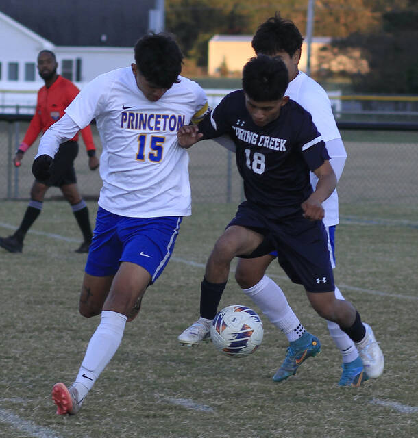 131014896_web1_NeuseSixChamps
Spring Creek sophomore Yonatan Perez (18) fights for possession of the ball against a Princeton opponent. Perez scored in the Gators 3-0 conquest of Beddingfield on Wednesday evening. (Rudy Coggins|mountolivetribune.com)