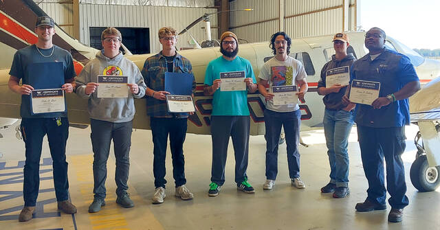 131032200_web1_Airframe-Certificates-10-2024-social
Seven students earned Airframe Certificates of Completion. Pictured from left to right, they are: Colin Best, Sean Logan, Matthew Raper, Roman Reconnu, Wade Parker, Jason McCardle, and Keonte Sidbury. (WCC photo)