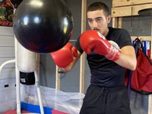 Young boxer aims for pro career with father firmly in his corner