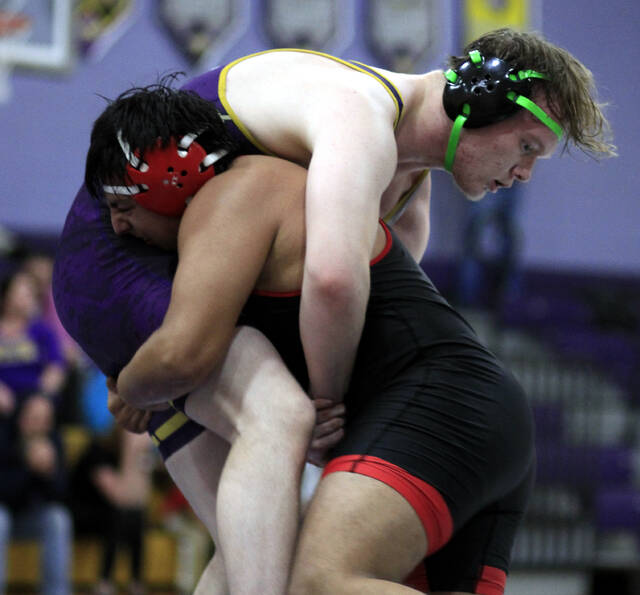 131067347_web1_Yusef
Southern Waynes Yusef Ceballos, left, works for a takedown against Rosewoods Nick Wade during their 215-pound match Wednesday evening. Ceballos eventually pinned Wade. (Rudy Coggins|mountolivetribune.com)