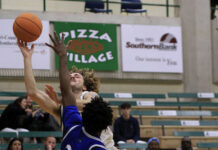
			
				                                University of Mount Olive’s Raeford Dunton attempts a shot against Shorter University defender Ja’Myas Davis (22) during first-half action Saturday afternoon. (Rudy Coggins|mountolivetribune.com)
 
			
		