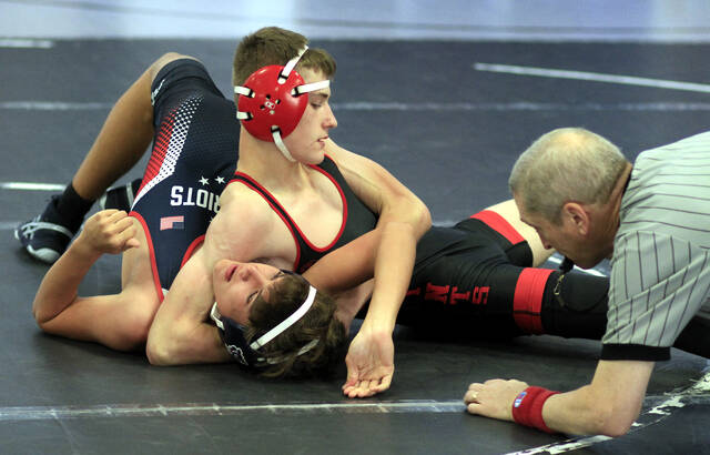 131103241_web1_SWZachSauls
Southern Waynes Zach Sauls pins Tucker Sullivan from American Leadership Academy in 33 seconds during their 138-pound match Wednesday at the Sass-Holmes Memorial Duals hosted by Rosewood High School. (Rudy Coggins|mountolivetribune.com)