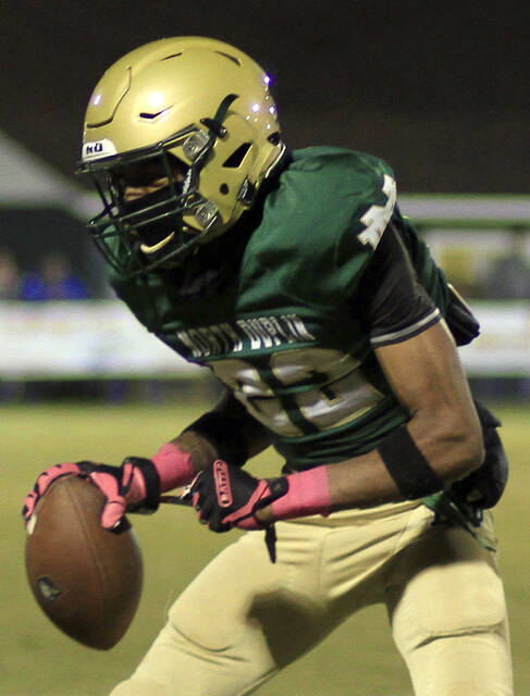 131108168_web1_NDFBArmwood
North Duplins Donovan Armwood celebrates after intercepting a pass in a game earlier this season. Armwood is one of 13 seniors who played their final game in a loss against Lakewood on Friday evening. (Rudy Coggins|mountolivetribune.com)