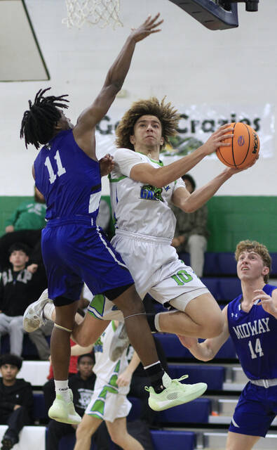 131139625_web1_Nathan
Spring Creeks Nathan Jackson, right, goes up for a shot and gets fouled during a recent game. Jackson scored 18 points during the Gators road loss Thursday evening at Parrott Academy. (Rudy Coggins|mountolivetribune.com)
