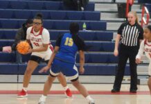 
			
				                                Lady Saint Aliyah Williams, #33, slows the pace down to allow her teammates to catch up and set for a rebound. (Robert Taylor|mountolivetribune.com)
 
			
		