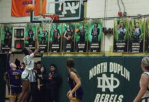 
			
				                                Lady Rebel Tateyawna Faison goes up for the layup in front of a Rosewood defender. (Robert Taylor|mountolivetribune.com)
 
			
		