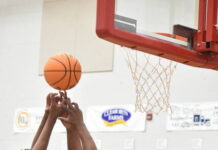 
			
				                                Noah Prices battles with a Leopard for control of the ball on a rebound.
 
			
		