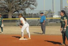
			
				                                No. 15 Kenadi Gideons with a good hit to get to second base. (Robert Taylor|mountolivetribune.com)
 
			
		
