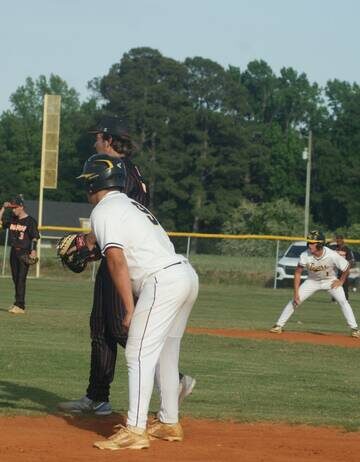 
			
				                                James Kenan’s Cal Avent, first base, and Eli Avent, second base, look to work together to advance themselves on the base paths.
                                 Robert P. Taylor|Mt. Olive Tribune

			
		
