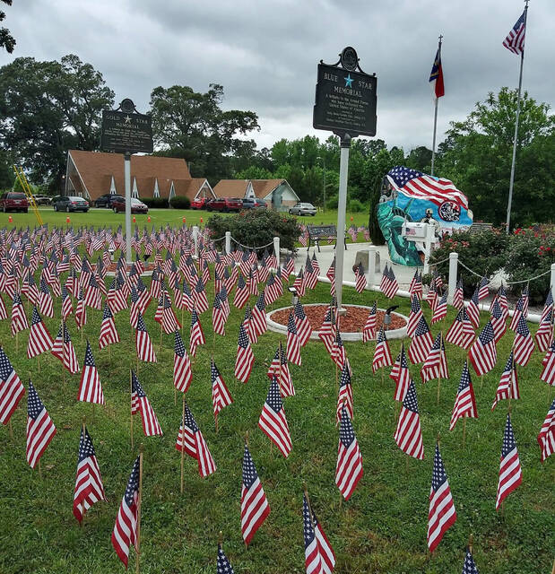 131488674_web1_Flags-3
Hundreds of U.S. flags cover the area in front of Dudley Christian Churchs Veterans Rock for last years Armed Forces Day observance at the church, 212 OBerry Rd., Dudley. The public is invited to the church fellowship hall on Saturday, May 10, for an 8 a.m. breakfast and then to help place the flags for this years observance that will be held at 11 a.m. Sunday, May 18, at the church. The public is invited to that event as well. (Photo courtesy Dudley Christian Church)