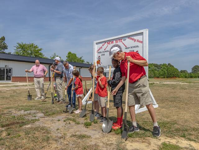 Wallace Christian Academy students and staff break ground for the new 11,000-square-foot middle school during ceremonies held April 30. The $1.2 million project is expected to be completed for the opening of the 2026-27 school year. (Courtesy photo)