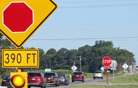 
			
				                                A sign and flashing light warn motorists traveling west on N.C. 55 toward Mount Olive that they are approaching the all-way stop at the road’s intersection with Secondary Road 1744 (Old Seven Springs Road and Indian Springs Road). The N.C. Department of Transportation plans to turn the intersection into a single-lane roundabout as part of an $8 million project that includes eliminating the intersection of N.C. 55 and North Church Street. Also, North Church Street will end with a cul-de-sac, and the Old Seven Springs Road/Indian Springs Road and North Church Street intersection will be converted to an all-way stop. (Steve Herring|mountolivetribune.com)
 
			
		