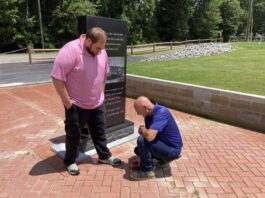 
			
				                                Faison Improvement Group President Andrew Taylor, left, and Faison Executive Administrator Jimmy Tyndall demonstrate removing one of the plain bricks surrounding the William Thornton monument and replacing it with a new, engraved brick. Personalized bricks are available for a $100 or $125 tax-deductible donation. For more information, go to FIG’s Facebook page or contact Jimmy Tyndall at jtyndall@faisonnc.org. (Kathy Grant Westbrook|mountolivetribune.com)
 
			
		
