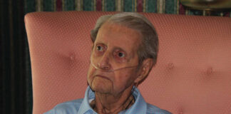 
			
				                                Johnny Powell listens as fellow Mason Raymond Turner Jr. speaks about Powell’s 70 years in the fraternal organization.
                                 Abby Cavenaugh | Sampson Independent

			
		